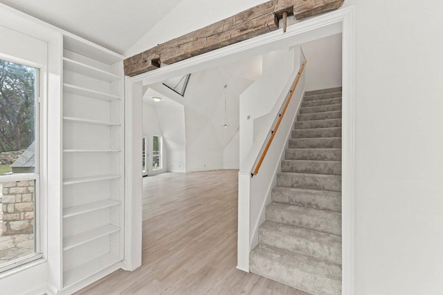 17226 Rocky Ridge Rd, Austin, TX 78734 - stairway with wood finished floors and vaulted ceiling