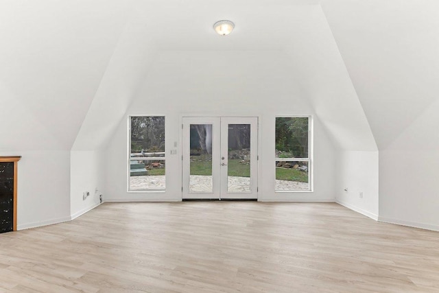 17226 Rocky Ridge Rd, Austin, TX 78734 - bonus room with vaulted ceiling, wood finished floors, and french doors