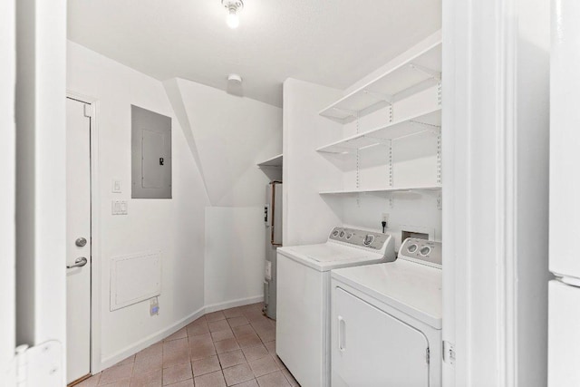 17226 Rocky Ridge Rd, Austin, TX 78734 - laundry room with electric panel, washing machine and dryer, light tile patterned floors, and water heater