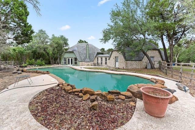 17226 Rocky Ridge Rd, Austin, TX 78734 - swimming pool with a patio area