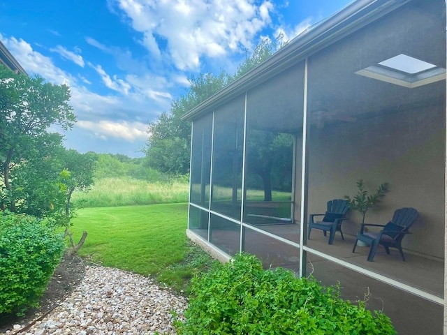 209 Crockett Loop, Georgetown, TX 78633 - view of grassy yard with a sunroom