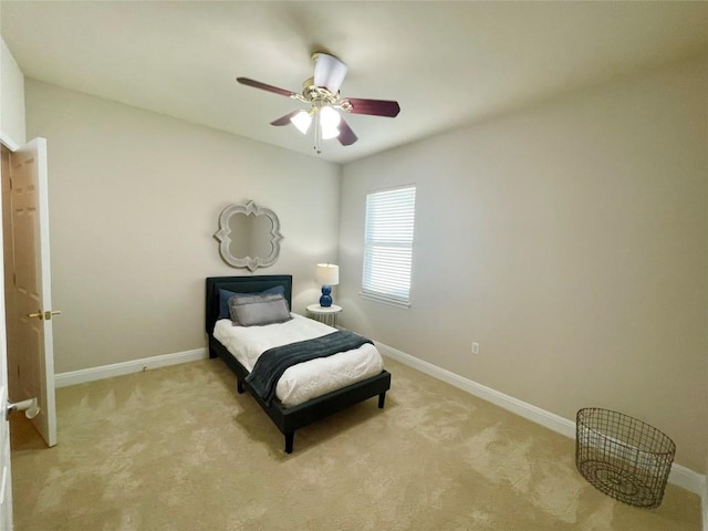209 Crockett Loop, Georgetown, TX 78633 - bedroom featuring light carpet and a ceiling fan