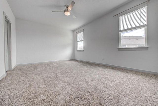 228 Tequilana Pass, Leander, TX 78641 - carpeted spare room featuring a ceiling fan and baseboards