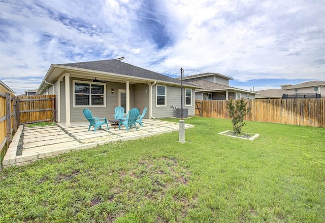 228 Tequilana Pass, Leander, TX 78641 - back of property with a fenced backyard, a patio, and roof with shingles