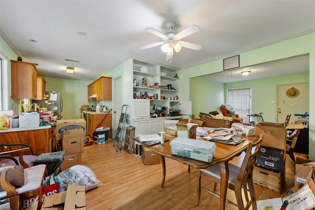 2329 Campden Dr, Austin, TX 78745 - dining space with a ceiling fan and light wood-type flooring