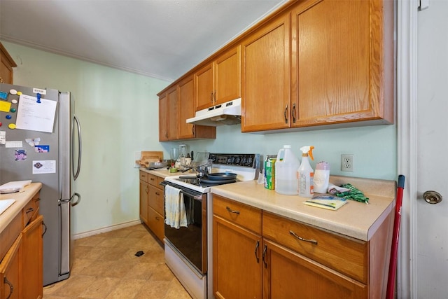 2329 Campden Dr, Austin, TX 78745 - kitchen featuring white electric range oven, under cabinet range hood, freestanding refrigerator, brown cabinets, and light countertops