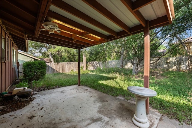 2329 Campden Dr, Austin, TX 78745 - fenced backyard featuring a patio area and a ceiling fan