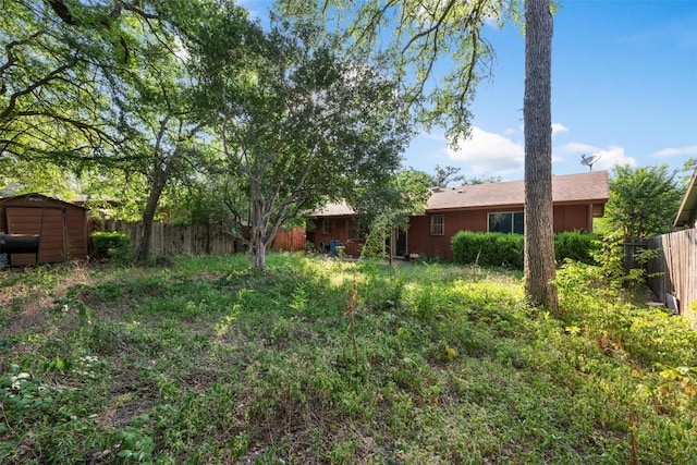 2329 Campden Dr, Austin, TX 78745 - view of yard featuring a storage shed