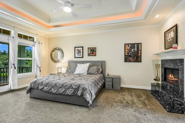 1208 Verdant Way, Austin, TX 78746 - bedroom featuring a raised ceiling, carpet, crown molding, a fireplace, and recessed lighting