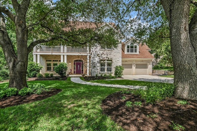 1208 Verdant Way, Austin, TX 78746 - view of front of home with driveway, a balcony, and a front yard
