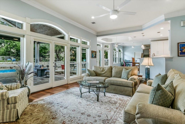 1208 Verdant Way, Austin, TX 78746 - living area with a ceiling fan, french doors, wood finished floors, crown molding, and recessed lighting