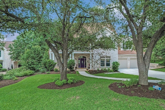 1208 Verdant Way, Austin, TX 78746 - obstructed view of property with driveway, a garage, and a front yard