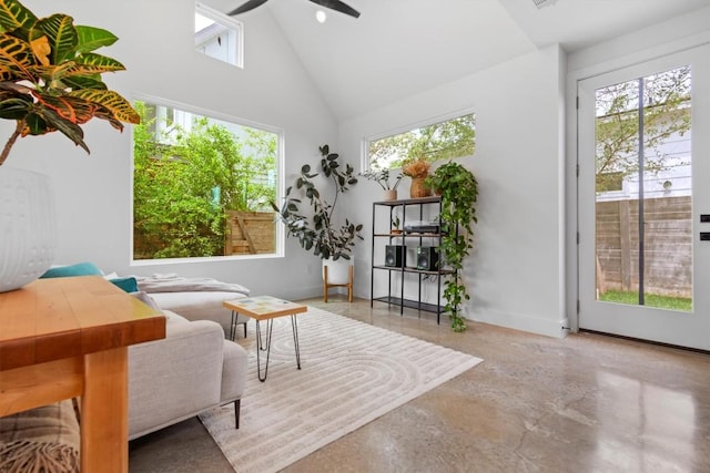 5006 Lott Ave Unit 2, Austin, TX 78721 - living area featuring plenty of natural light, high vaulted ceiling, ceiling fan, and concrete flooring