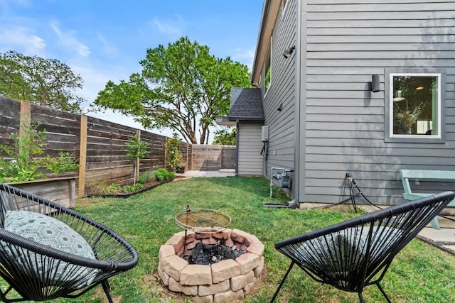 5006 Lott Ave Unit 2, Austin, TX 78721 - fenced backyard with a fire pit