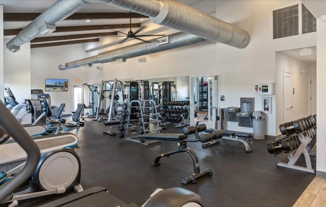 963 Tomichi Trl, Lakeway, TX 78738 - workout area with a towering ceiling, a ceiling fan, and beam ceiling