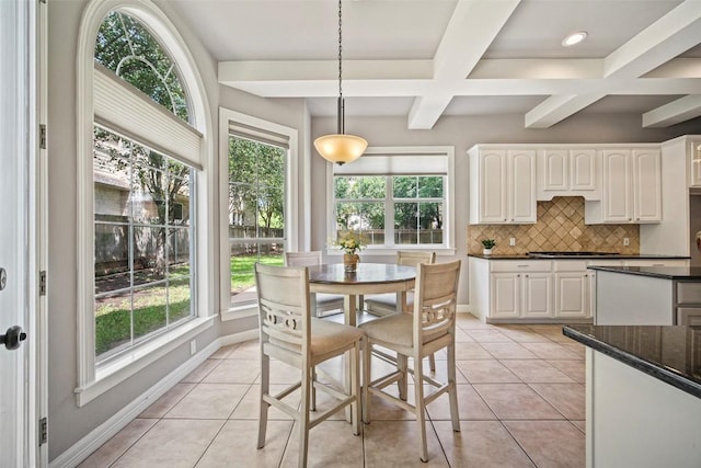 10908 Sans Souci Pl, Austin, TX 78759 - dining room featuring healthy amount of natural light, beamed ceiling, coffered ceiling, light tile patterned flooring, and recessed lighting