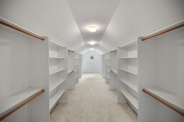 10908 Sans Souci Pl, Austin, TX 78759 - walk in closet with light carpet and lofted ceiling