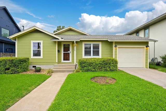 6102 Laird Dr, Austin, TX 78757 - view of front of property featuring concrete driveway, an attached garage, a front lawn, and a shingled roof