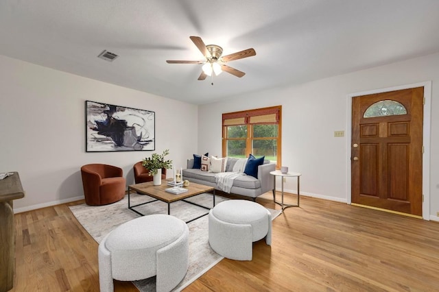6102 Laird Dr, Austin, TX 78757 - living room with a ceiling fan and light wood-style floors