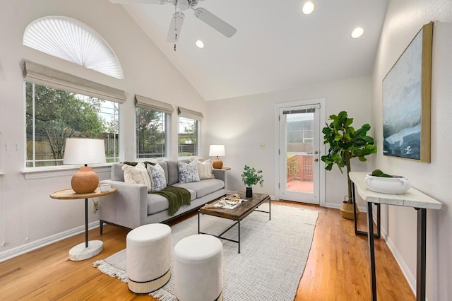 6102 Laird Dr, Austin, TX 78757 - living room featuring light wood-type flooring, ceiling fan, high vaulted ceiling, and recessed lighting