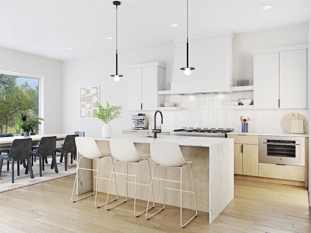 4604 Englewood Dr, Austin, TX 78745 - kitchen with open shelves, wall oven, light countertops, hanging light fixtures, and recessed lighting