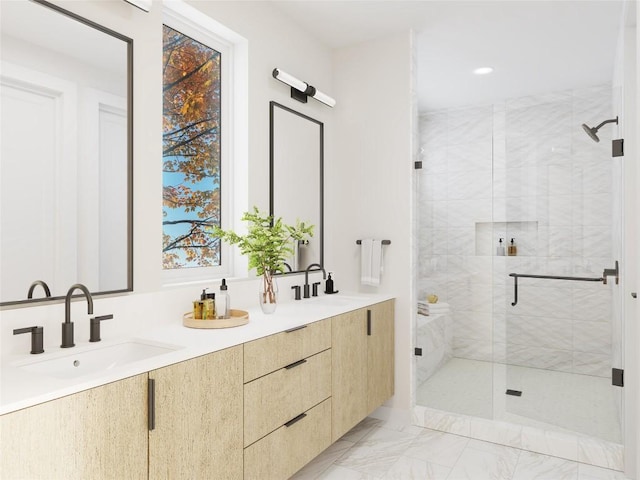4604 Englewood Dr, Austin, TX 78745 - full bath with a stall shower, double vanity, marble finish floors, and recessed lighting