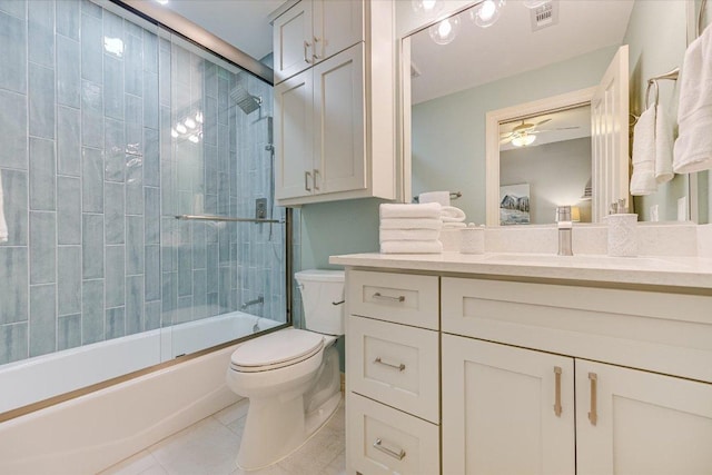 280 Whitney Run, Buda, TX 78610 - full bathroom with a ceiling fan, vanity, combined bath / shower with glass door, and tile patterned flooring