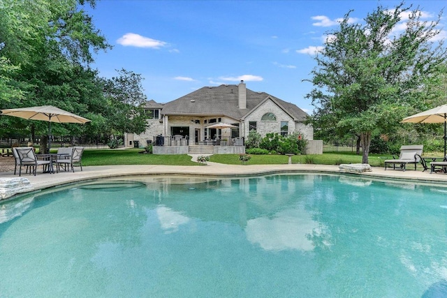 280 Whitney Run, Buda, TX 78610 - swimming pool with a patio area and a lawn