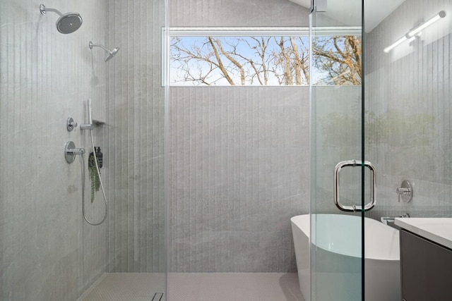 3402 Goodwin Ave Unit 1, Austin, TX 78702 - bathroom featuring a shower stall, a freestanding tub, and vanity