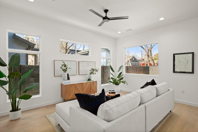 3402 Goodwin Ave Unit 1, Austin, TX 78702 - living room featuring recessed lighting, light wood-type flooring, and a ceiling fan