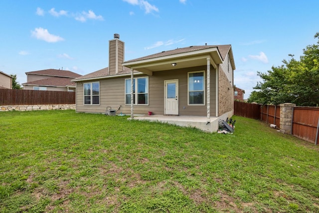 12000 Kincardine Way, Austin, TX 78754 - rear view of property featuring a patio, a fenced backyard, and a chimney
