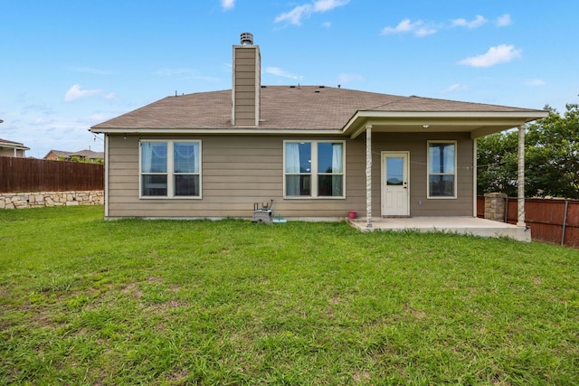 12000 Kincardine Way, Austin, TX 78754 - back of house featuring a patio area, a fenced backyard, a chimney, and roof with shingles