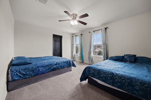 12000 Kincardine Way, Austin, TX 78754 - bedroom featuring carpet floors and a ceiling fan