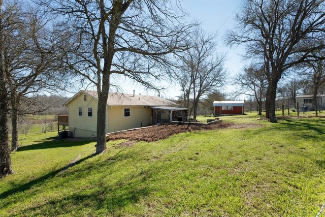 175 Settlers Trl, Elgin, TX 78621 - view of green lawn featuring an outbuilding