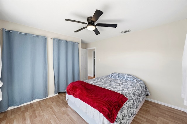175 Settlers Trl, Elgin, TX 78621 - bedroom with wood finished floors and a ceiling fan