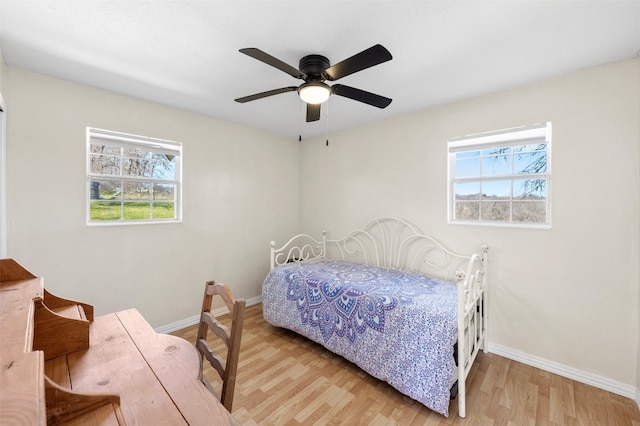 175 Settlers Trl, Elgin, TX 78621 - bedroom with light wood-style floors and a ceiling fan