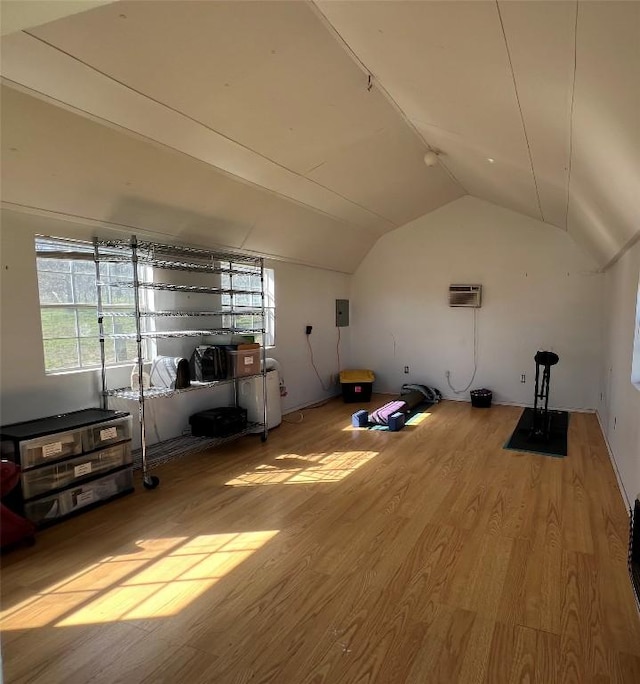 175 Settlers Trl, Elgin, TX 78621 - bonus room featuring wood finished floors, an AC wall unit, vaulted ceiling, and electric panel