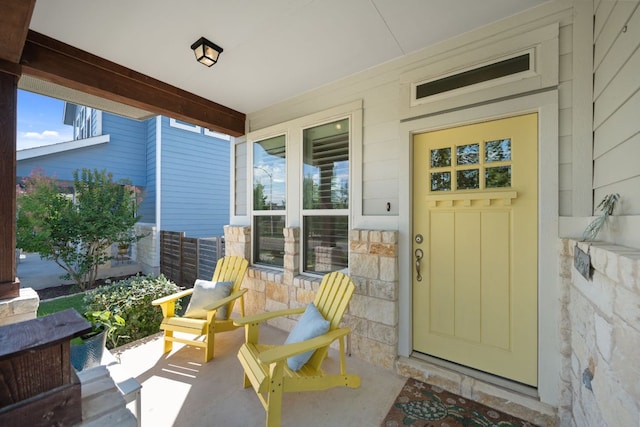 8713 Alderman Dr, Austin, TX 78747 - property entrance with a porch and stone siding