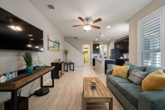 8713 Alderman Dr, Austin, TX 78747 - living area featuring ceiling fan, recessed lighting, and light floors