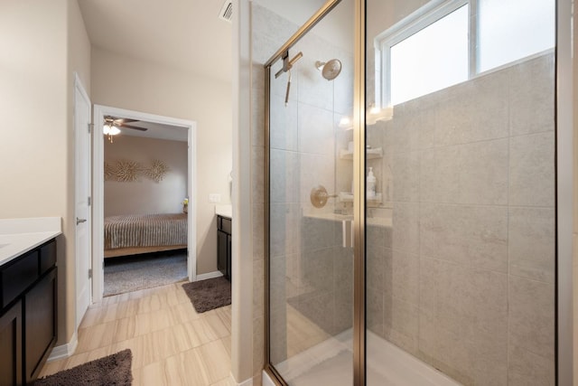8713 Alderman Dr, Austin, TX 78747 - full bathroom featuring vanity, connected bathroom, and a stall shower