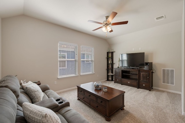 8713 Alderman Dr, Austin, TX 78747 - living area featuring a ceiling fan, lofted ceiling, and light colored carpet