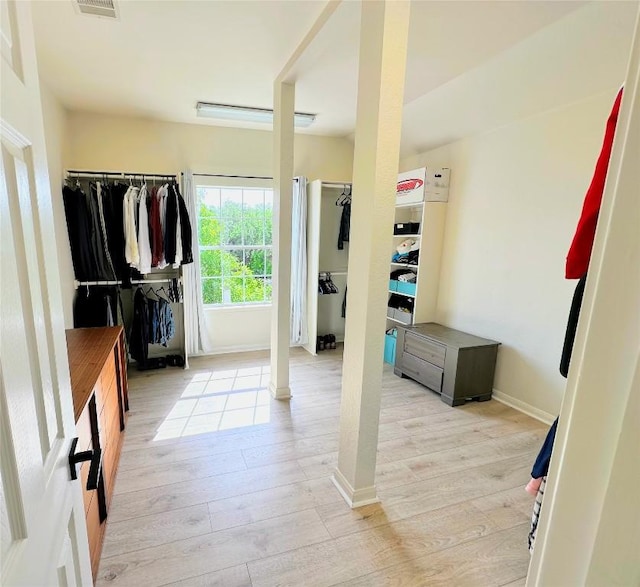 12504 Gun Metal Dr, Austin, TX 78739 - mudroom featuring light wood finished floors and baseboards