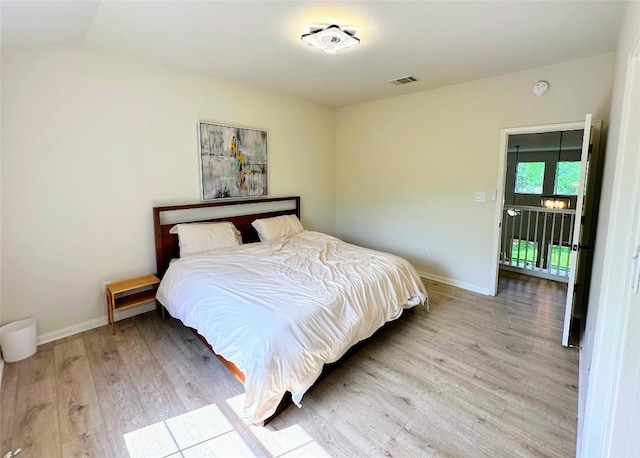 12504 Gun Metal Dr, Austin, TX 78739 - bedroom featuring light wood finished floors and baseboards