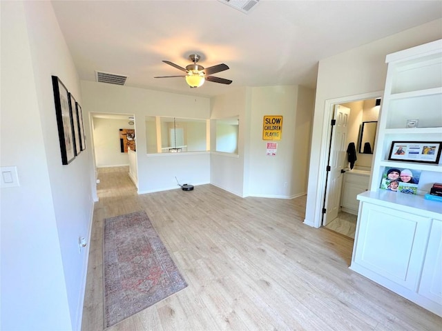 12504 Gun Metal Dr, Austin, TX 78739 - spare room with a ceiling fan and light wood-style floors