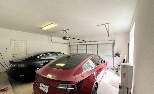 12504 Gun Metal Dr, Austin, TX 78739 - garage featuring a garage door opener