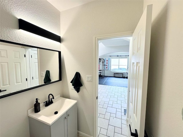 12504 Gun Metal Dr, Austin, TX 78739 - bathroom featuring vanity and baseboards