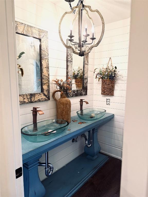 4204 Deer Tract St, Round Rock, TX 78681 - bathroom with a chandelier and wood finished floors