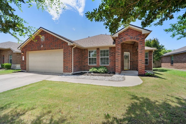 3713 Eagle Fledge Ter, Pflugerville, TX 78660 - traditional-style house with a garage, brick siding, a front lawn, driveway, and roof with shingles
