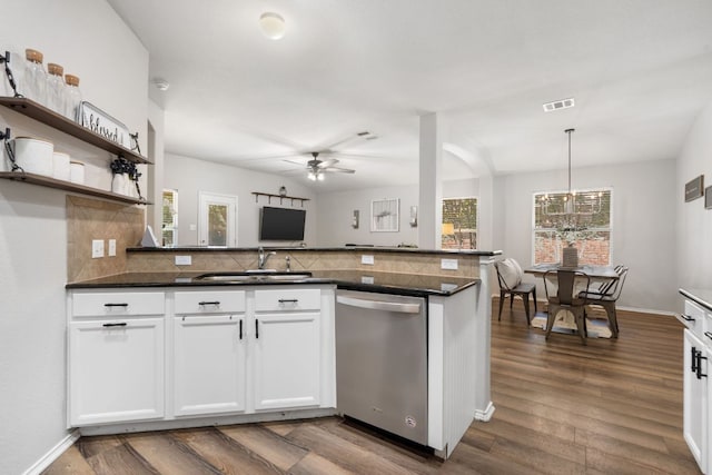 3713 Eagle Fledge Ter, Pflugerville, TX 78660 - kitchen featuring dishwasher, backsplash, a ceiling fan, dark countertops, and dark wood-style flooring