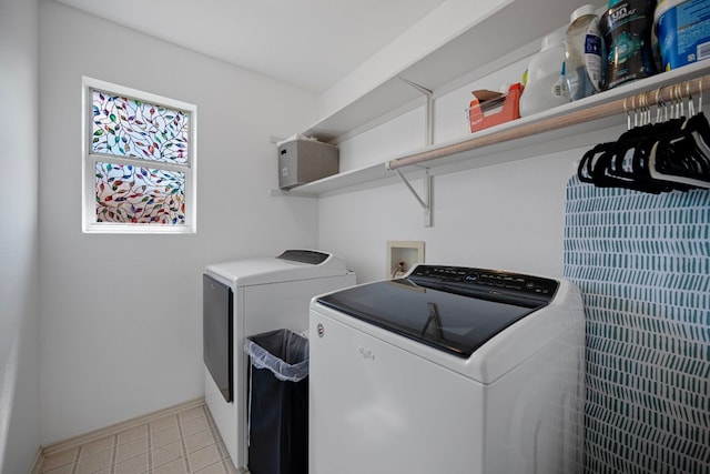 1913 Avante Dr, Cedar Park, TX 78613 - laundry room featuring separate washer and dryer and light tile patterned floors